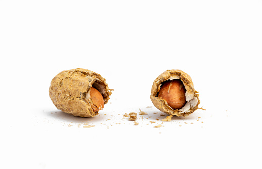 shelled peanuts, cut in half