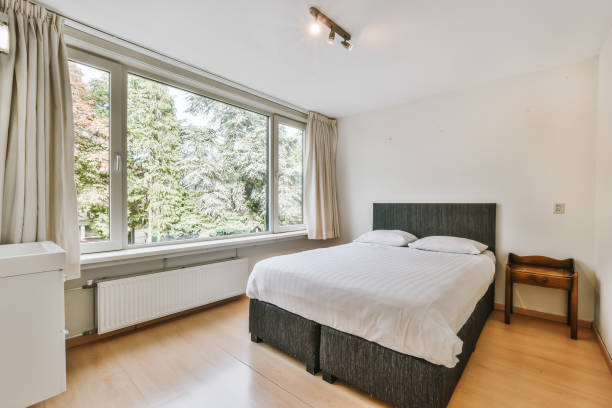istock A magnificent bedroom with a soft bed covered 1375572415