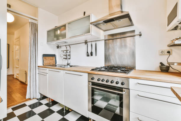 istock Lovely kitchen with black and white tiled floor 1375573609
