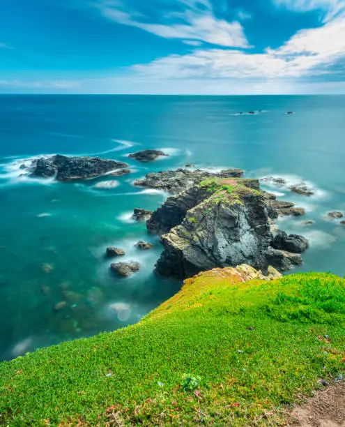 Photo of The Lizard peninsula,clifftop and rocky cove in summertime,southern Cornwall, England, United Kingdom.