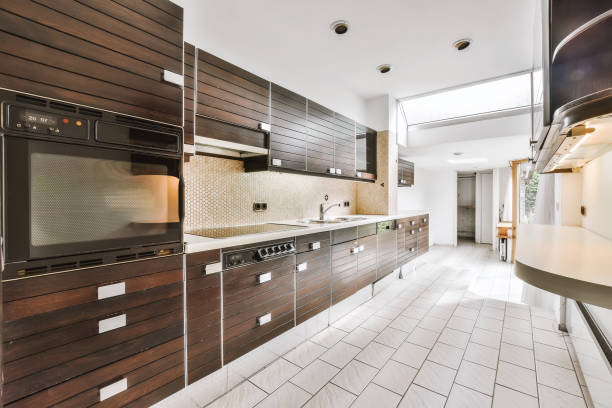 istock Luxurious and large kitchen with wooden kitchen set 1375651136