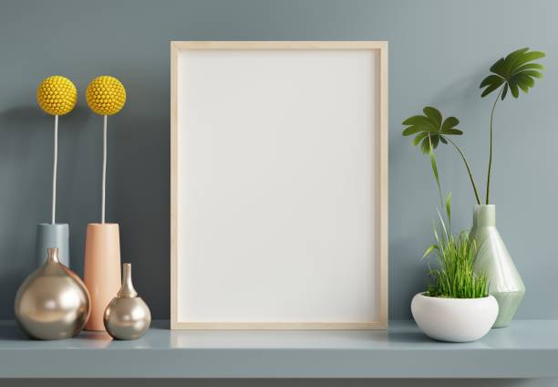 istock Poster mockup with wooden frame in home interior on blue wall background. 1375651186