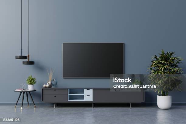 Led Tv On The Dark Blue Wall In Living Roomminimal Design Stock Photo - Download Image Now