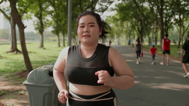 Over weight woman working out