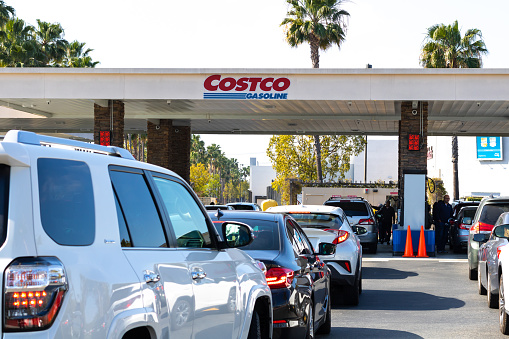 Irvine, CA USA - February 20, 2022: Close up view of Costco Gasoline packed with vehicles