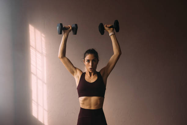 strong shoulder exercise woman ripl fitness 