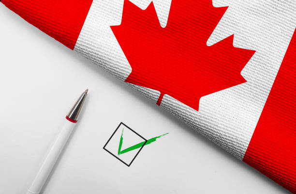 istock Flag of Canada and check mark 1375745629