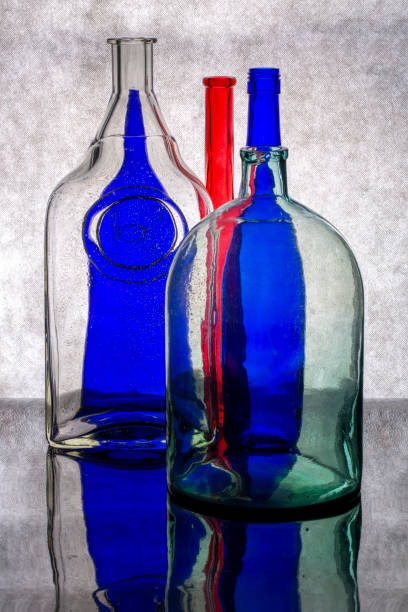 istock Still life with glass multicolored dishes on a gray background 1375765932