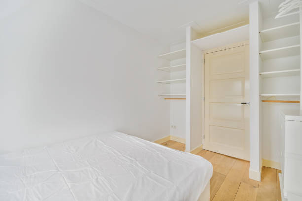 istock Attractive small bedroom with a soft bed 1375765933