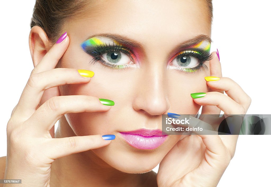 Rainbow makeup Woman face with rainbow makeup and manicure Adult Stock Photo