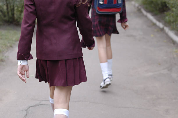 schoolgirls2 walking schoolgirls skirt stock pictures, royalty-free photos & images