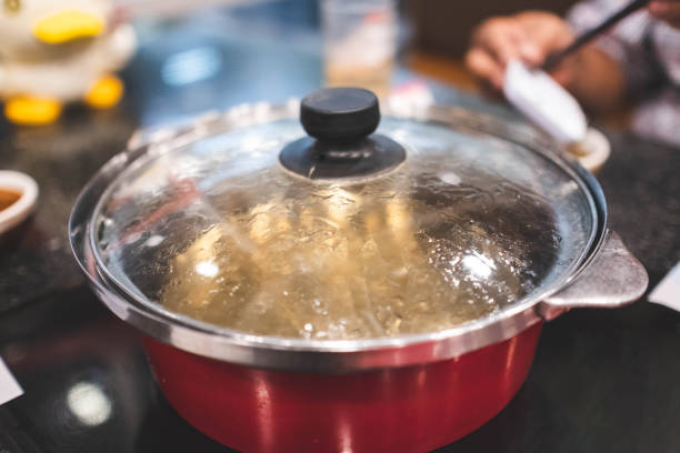 istock Boiling Soup in Sukiyaki Pot. 1375841554