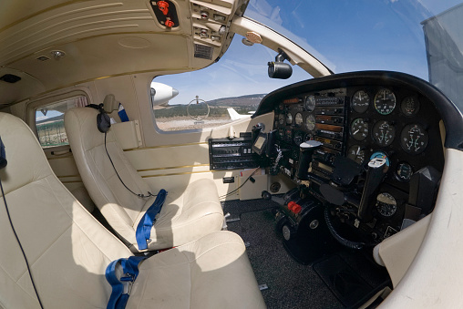 A cockpit of the small sports aircraft at the airport.