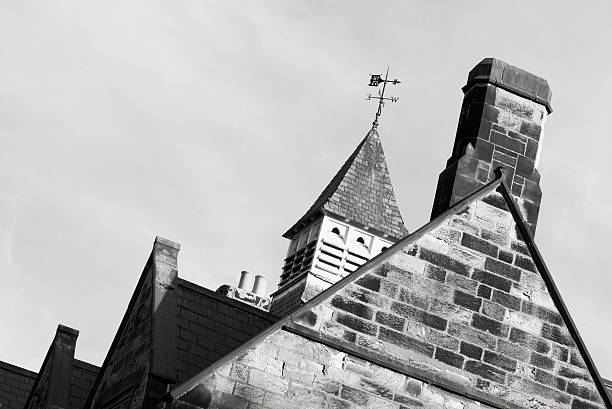 istock English roofs with weathercock 137585436