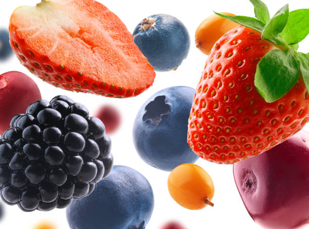 istock Many different berries in the form of a frame on a white background 1375855693