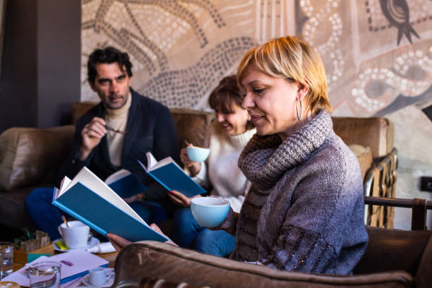 istock Reading at the book club 1375862608