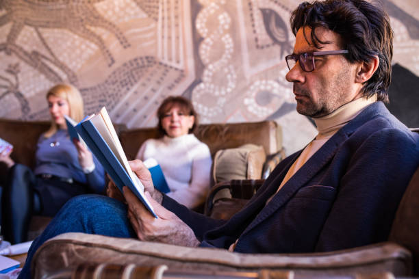 istock A mature man enjoying a good book 1375862938