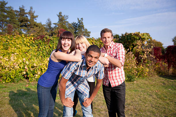 istock Young happy people outdoor 137587446