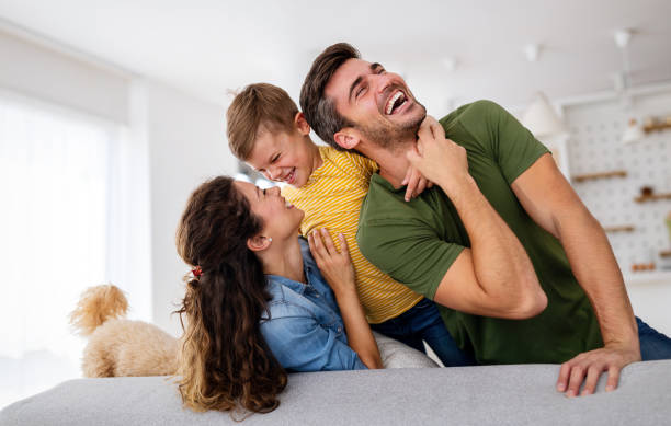 istock Happy family spending time together, playing at home. 1375877282