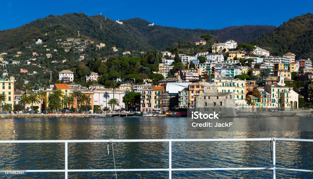 Seaside village of Rapallo, Italy View from sea of picturesque seaside village of Rapallo in sunny day, Italy Ancient Stock Photo
