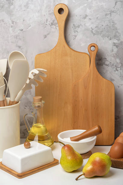 istock Cooking utensil and ingredients for cooking recipe on kitchen table. Front view 1375883119