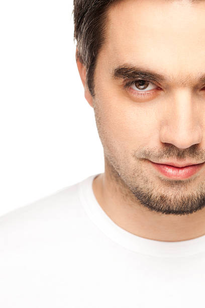 istock Half Face Of Young Man In White 137588341