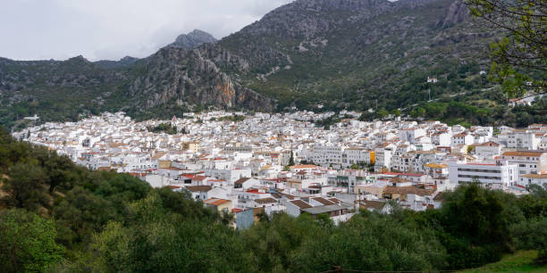 panorama view of the idyllic whitewashed andalusian town of ubrique in the los alcornocales nature park - ubrique imagens e fotografias de stock