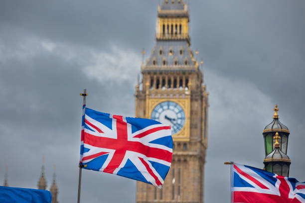 istock Union Jack flag and Big Ben in background 1375898247