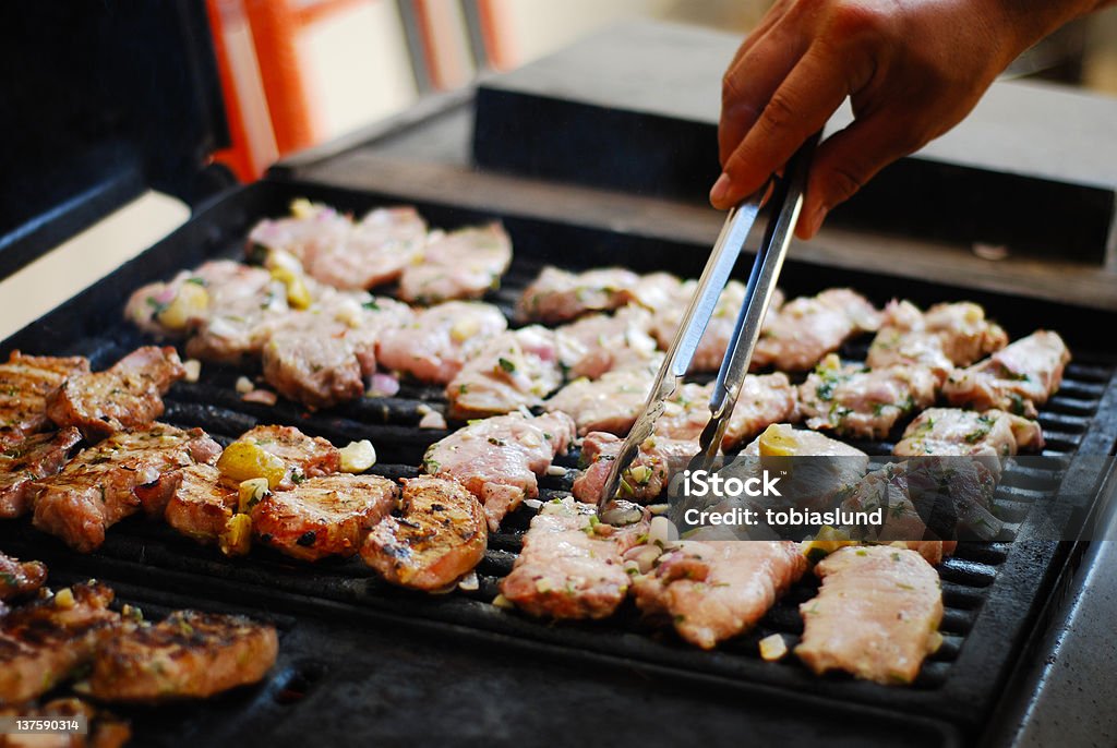 Saftiges Schweinefleisch vom grill - Lizenzfrei Abnehmen Stock-Foto