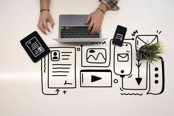 istock A man is traying to create digital content on her computer with line icons 1375921188