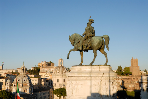 Statue of Victor Emmanuel on horseback on the Victor Emmanuel Monument overlooking the city of Rome Italy