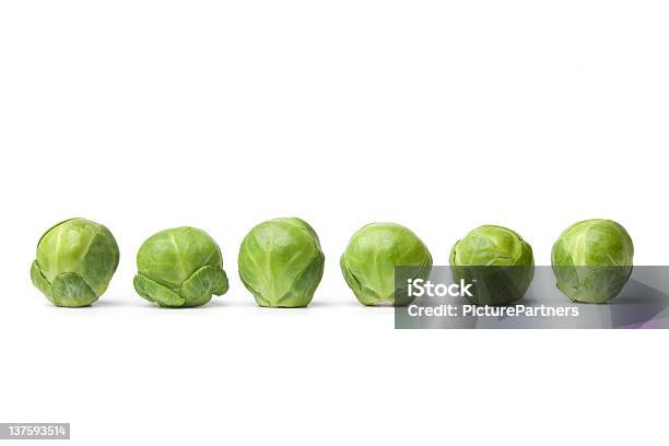 Row Of Fresh Brussel Sprouts Stock Photo - Download Image Now - Brussels Sprout, White Background, Food