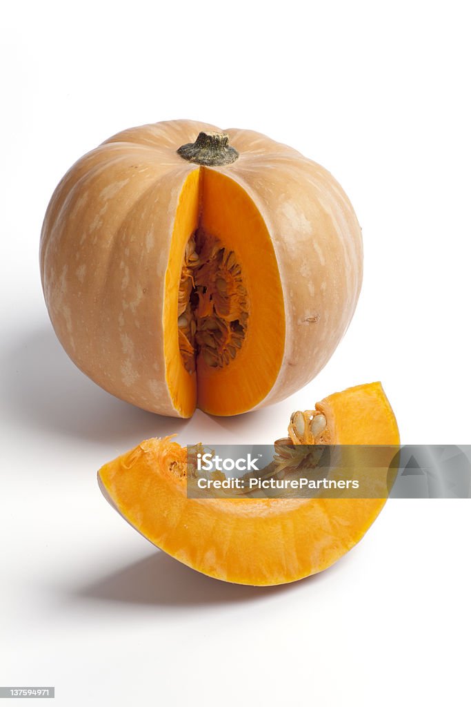 Pumpkin with a slice Pumpkin with a slice on white background Cross Section Stock Photo
