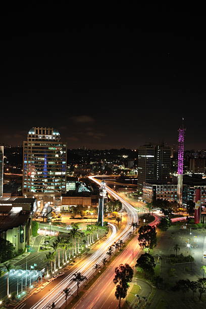 Night view of Sao Paulo city skyline with Morumbi shopping mall, Sao Paulo, Brazil.