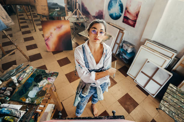 istock High angle view of an artist looking at the camera 1375959995