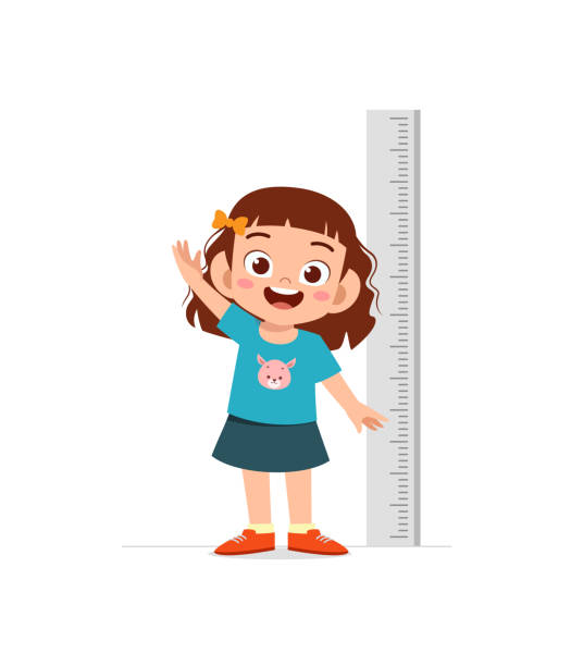 istock cute little girl measure height for grow progress 1375962701