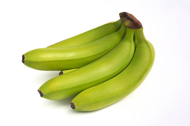 Green banana on green background.