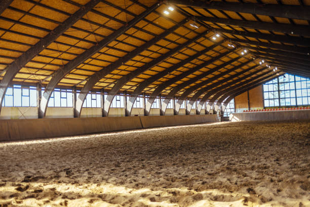 istock Empty indoor arena for horse riding. 1375996670