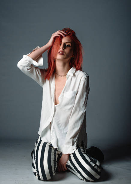 istock Cool fashionable redhead girl 1375998852