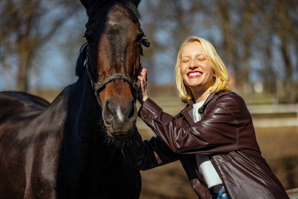 istock There is a bond between horse and girl. 1376001481
