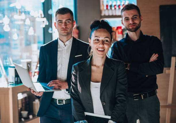 istock Group of business colleagues in coffee bar 1376006576