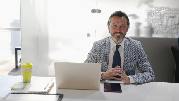 istock Mature  businessman looking at camera 1376007139