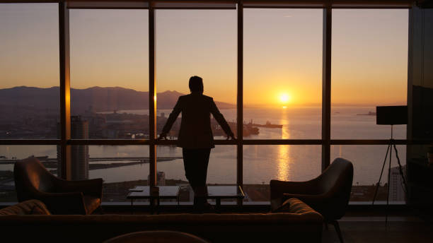 istock Business manager in the office during sunset 1376007378