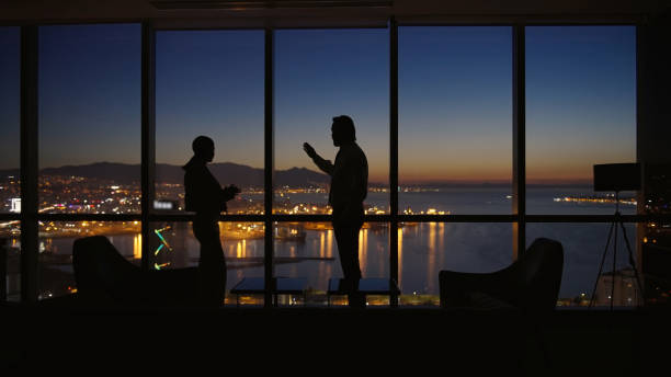 istock Corporate business managers in the office at night 1376008065