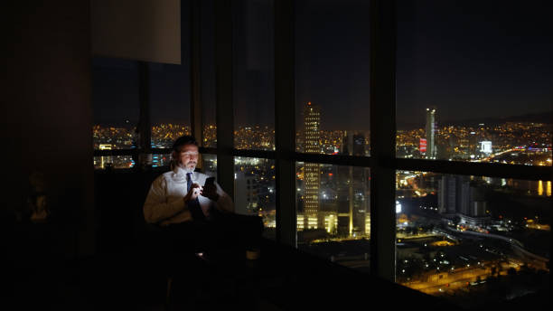 Corporate business manager in the office at night