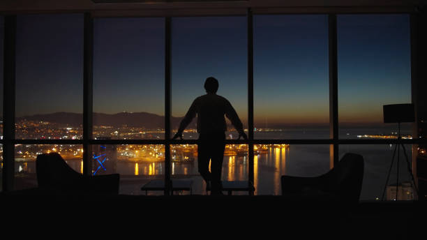 Corporate business manager in the office at night.