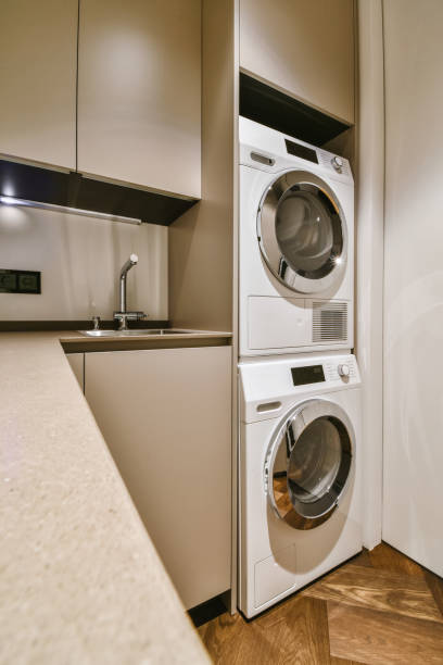 istock Attractive laundry room with washing machine 1376008408