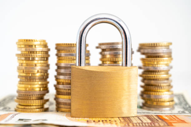 istock Padlock next to money. Economic sanctions. 1376008660