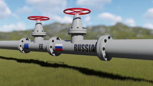 the gas pipeline with flags of russia and eu - rusland stockfoto's en -beelden