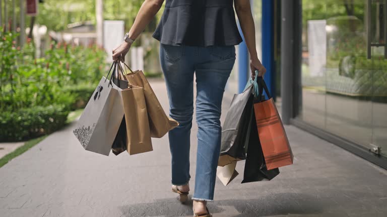 Woman walking with Sopping bag, Slow motion, Shoot format on 4:2:2 10bit